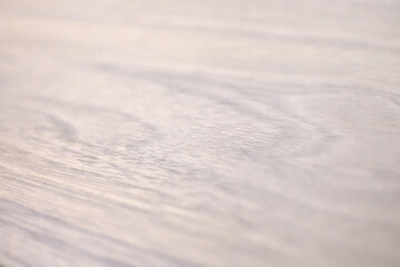 白っぽい色の木の板の接写　木材　木目　テクスチャ　木製テーブル　屋内