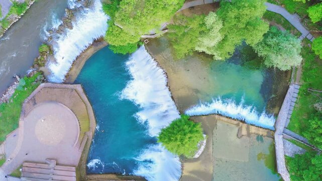 Waterfall and river confluence aerial