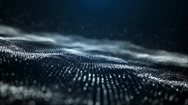 A close-up view depicts a luminescent digital waveform. White, sparkling particles ripple and undulate against a dark, blueish backdrop