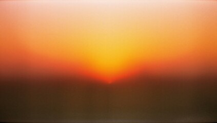 Abstract sunset background with vibrant orange and yellow hues suitable for design projects