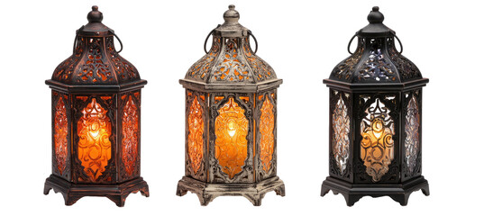 Three decorative metal lanterns in varying colors with ornate designs and glowing interiors