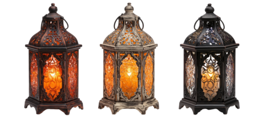 Three decorative metal lanterns in varying colors with ornate designs and glowing interiors