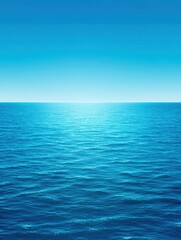 Obraz premium A serene blue ocean stretches under a clear sky, creating a tranquil atmosphere perfect for wellness, travel, or nature themes, Ideal for backgrounds or promoting relaxation and calmness,