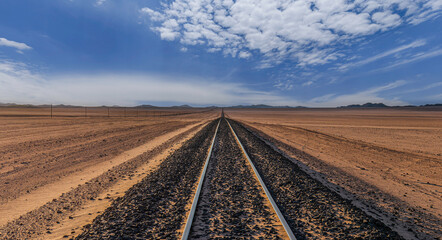Railroad into the vast desert of Namibia