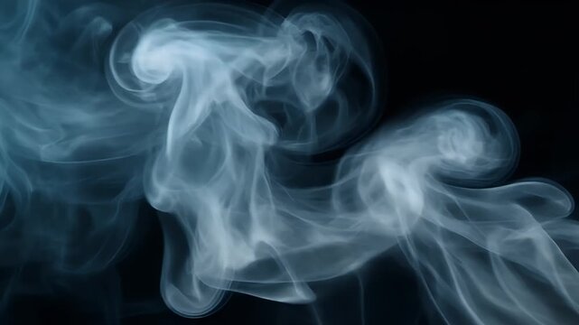 A captivating image features wisps of pale blue smoke, swirling and interacting against a dark backdrop. The composition suggests motion