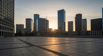 Obraz premium Empty city plaza at sunrise. Skyscrapers line the horizon