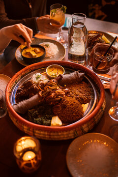 Traditional Ethiopian meal consisting of meat stew and vegetables on table at fine dining restaurant