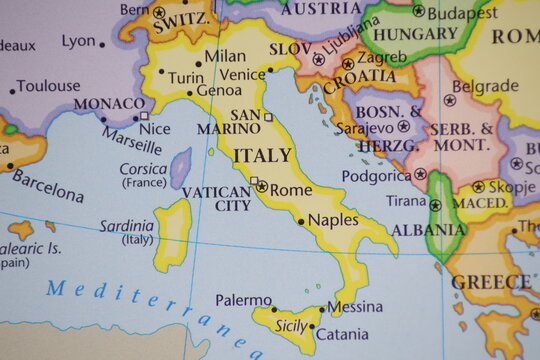 Italy Political Map Close Up. High Detailed View of Rome, Naples, Sicily and Vatican City on Paper Atlas. Southern Europe Geography, Mediterranean Sea Borders and European Union Travel Concept.
