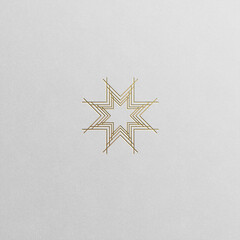 Golden star geometric symbol isolated on white background.	
