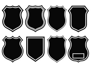 A collection of various black shield shapes with white outlines