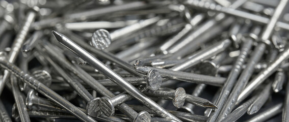 Pile of steel nails texture, construction and hardware concept