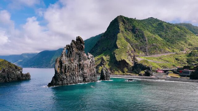 Rocky sea stacks of Ilheus da Ribeira da Janela emerging from the Atlantic Ocean near the coast of Madeira Island