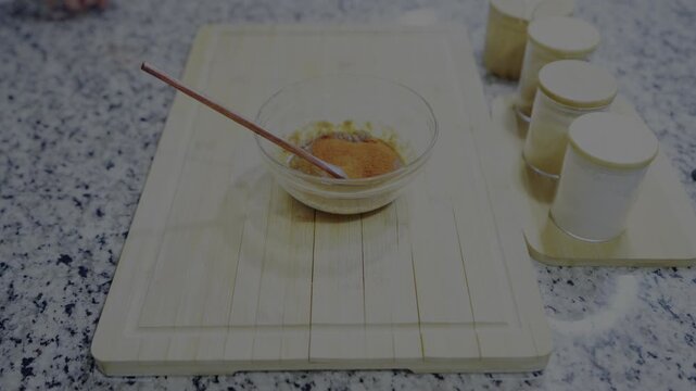 preparation of a healthy spicy marinade with natural ingredients in a kitchen