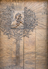 CAVA DE TIRRENI, ITALY - OCTOBER 7, 2025: The modern bronze gate with Madonna on the church Basilica Pontificia di Santa Maria Incoronata dell&rsquo; Olmo by Giuseppe Ciolli (2010).