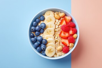 Colorful oatmeal bowl with fruits and nuts