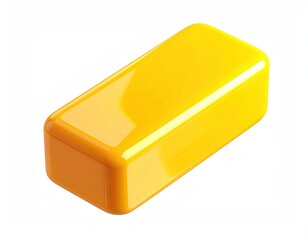 A shiny, yellow rectangular object on a white background, lit from above