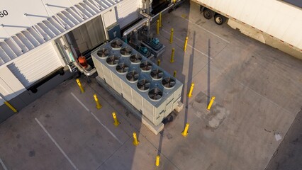 Industrial air conditioning vent. HVAC. Commercial cooling HVAC air conditioner condenser fan units climate control and refrigeration temperature system, outside cold storage warehouse