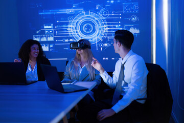 Group of professionals engaging in virtual reality experience during a business meeting