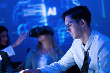 Professionals engaged in virtual reality technology demonstration at a tech conference in a modern setting