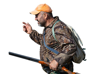 A hunter with a gun in camouflage clothing. A senior man with a gun, medium shot, searching for game.