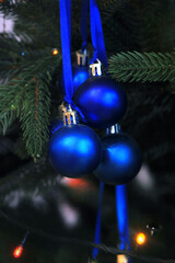 Group of navy blue hanging balls christmas tree decoratin ornament.Christmas holiday , decoration, winter seasonal greeting concept. Free copy space.