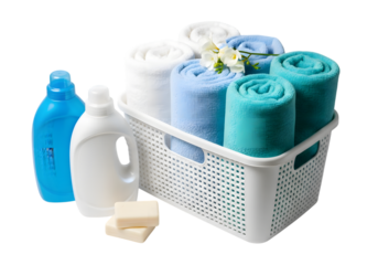 Laundry Essentials in White Basket with Towels and Soap Isolated on transparent background