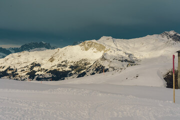 Snowy mountain peaks in winter ski resort landscape in klosters