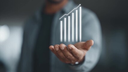 Hand Holding Graph Symbolizes Upward Growth and Success in Business, Showcasing Progress and Optimism in Financial Endeavors - Powered by Adobe