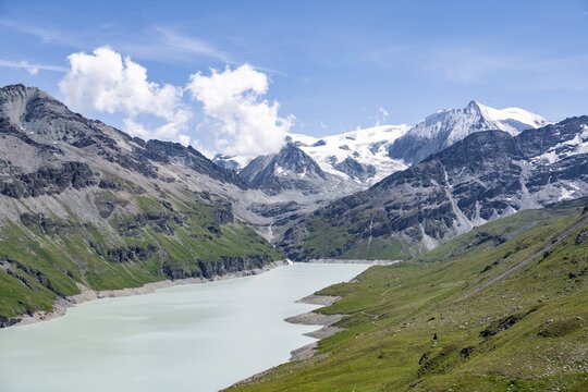 Blue mountain lake in a mountain landscape with glaciers, Lac des Dix reservoir and Mont Blanc de Cheilon peak, Valais Alps, Valais, Switzerland