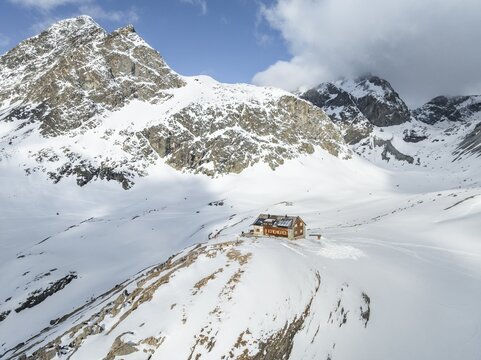Aerial view, Piz Picuogl, winter in the mountains, Chamanna Jenatsch CAS, Swiss Alpine Club hut, Val Beve, Grisons, Switzerland