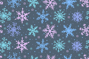 Seamless winter pattern with pastel snowflakes on a gray background. Cute decorative snowflake design perfect for Christmas, winter holidays, wrapping paper, textiles, backgrounds, and seasonal design