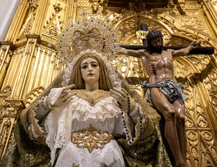 Olvera, Spain - 7 May 23: Virgin Mary and Jesus Christ Statue in Ornate Setting