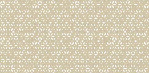 Golden vector seamless pattern with diamond shapes, floral silhouettes. Luxury gold background with halftone effect, randomly scattered shapes. Trendy festive texture. Minimalist repeating design
