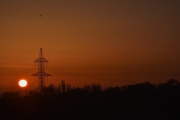 Sunrise over the city in the early morning. Winter fogy landscape