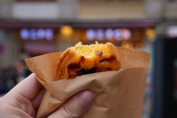 Macau style egg tart. Custard tart in Cantonese cuisine. Pastel de nata pastry.