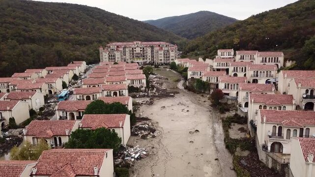 Aerial view of buildings with red roofs, nestled among mountains, showing a landscape, Elenite, Burgas, Bulgaria.