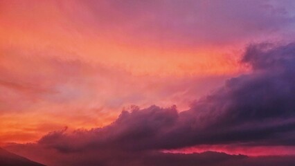 A scenic view of  colorful sunset sky. Serene vibrant sunset.