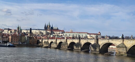 Obraz premium Scenic View of Charles Bridge and Vltava River in Prague