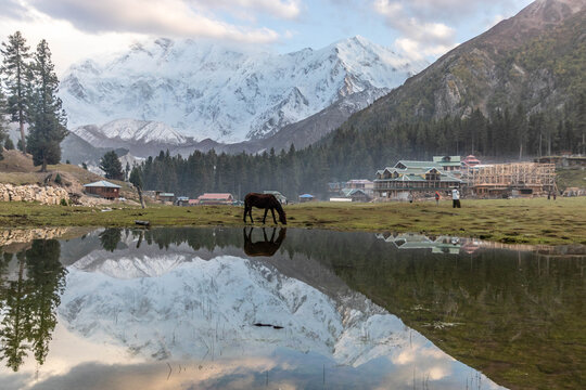Reflection lake in Fairy Meadows under Nanga Parbat mountain in Gilgit-Baltistan region in Pakistan