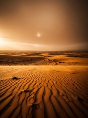 Sand dunes with ripples and a bright sun in the desert landscape at sunset or sunrise.