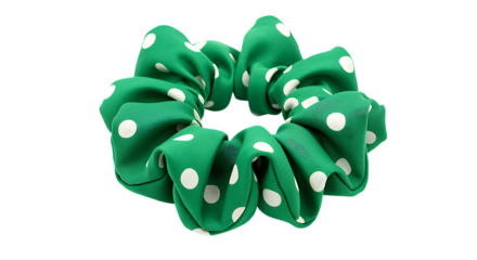 A vibrant green scrunchie with white polka dots presented beautifully on transparent background.