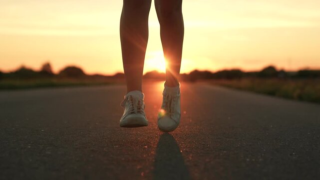 silhouette sports girl running legs along road sunset, marathon preparation lifestyle, running athlete, profile exercises, fitness sports woman running up, sunset health, professional runner stadium