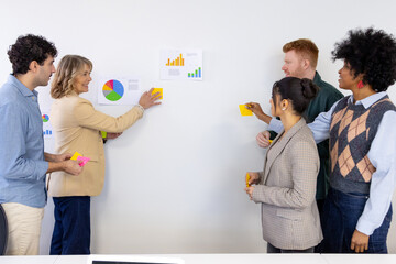 Diverse startup team collaborating on business strategy