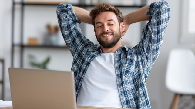 clouse up Remote worker closing laptop and stretching near desk, end of workday ritual, work life balance and burnout prevention theme, clean modern workspace, copy space, unplugge