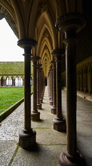 Gothic Cloister with Stone Columns at Mont Saint-Michel Abbey, France