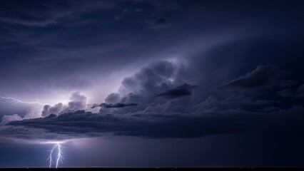 A lightning bolt strikes from a dark storm cloud with flashes of light illuminating the sky.