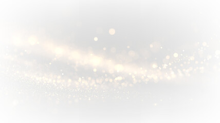 Bright particles float above a light gray background, creating a soft and glowing effect in the space