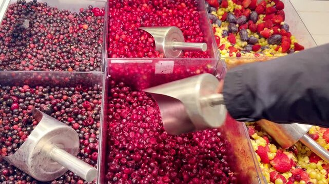 buying  frozen fruits and  berries ( cranberries, currants)at the market