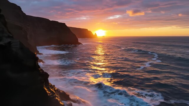 Sunset waves crashing on rocky cliffs