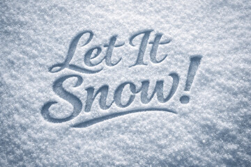 Joyful holiday phrase let it snow carved into fresh snow powdery surface. Cool monochrome palette with soft directional light create embossed typography with festive feeling